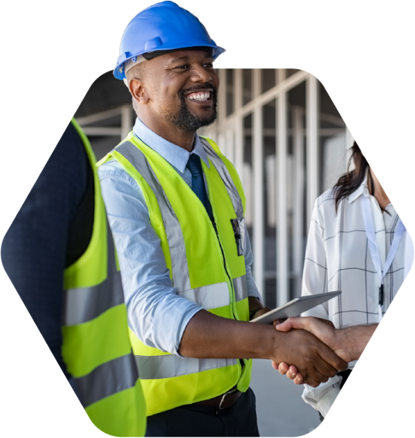 Construction worker shaking hands
